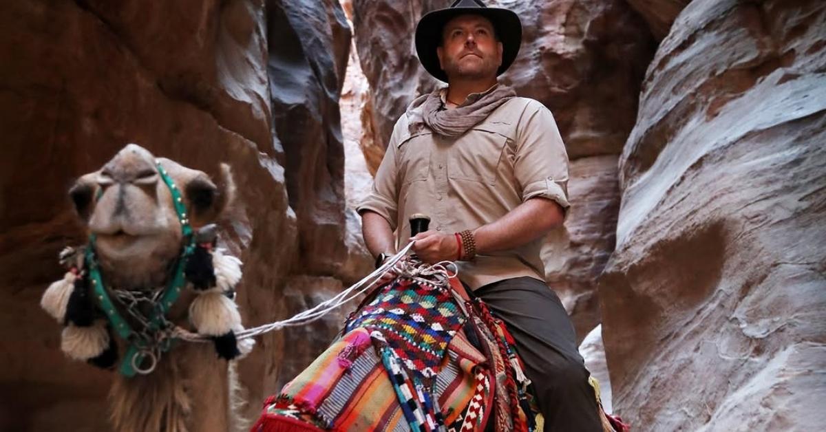 Josh Gates on a camel