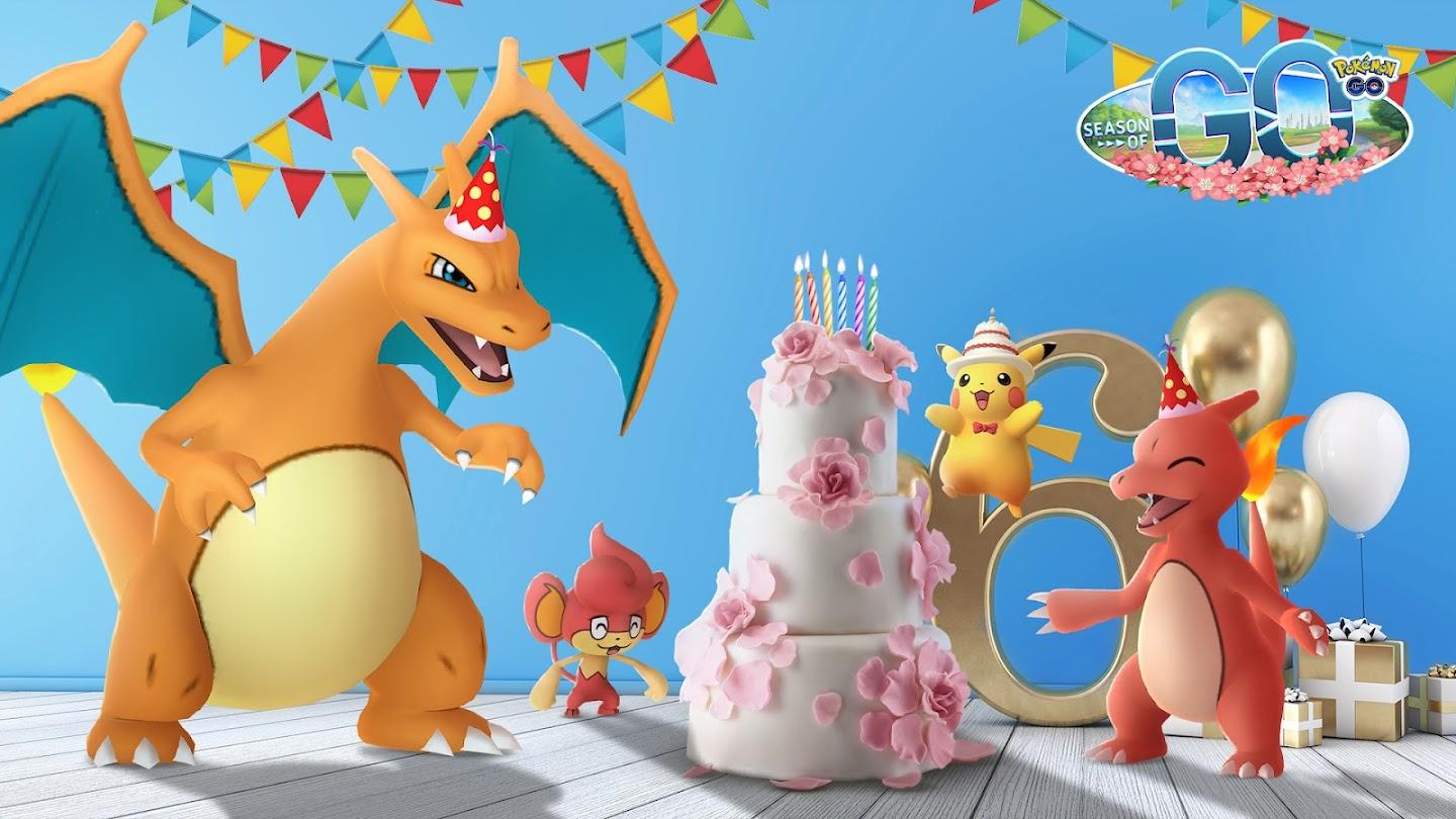 'Pokémon GO' Promo art of Charizard and other creatures standing around a birthday cake.