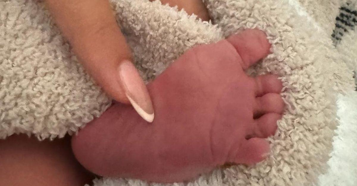 Hailey Bieber's fingernail on her baby's foot