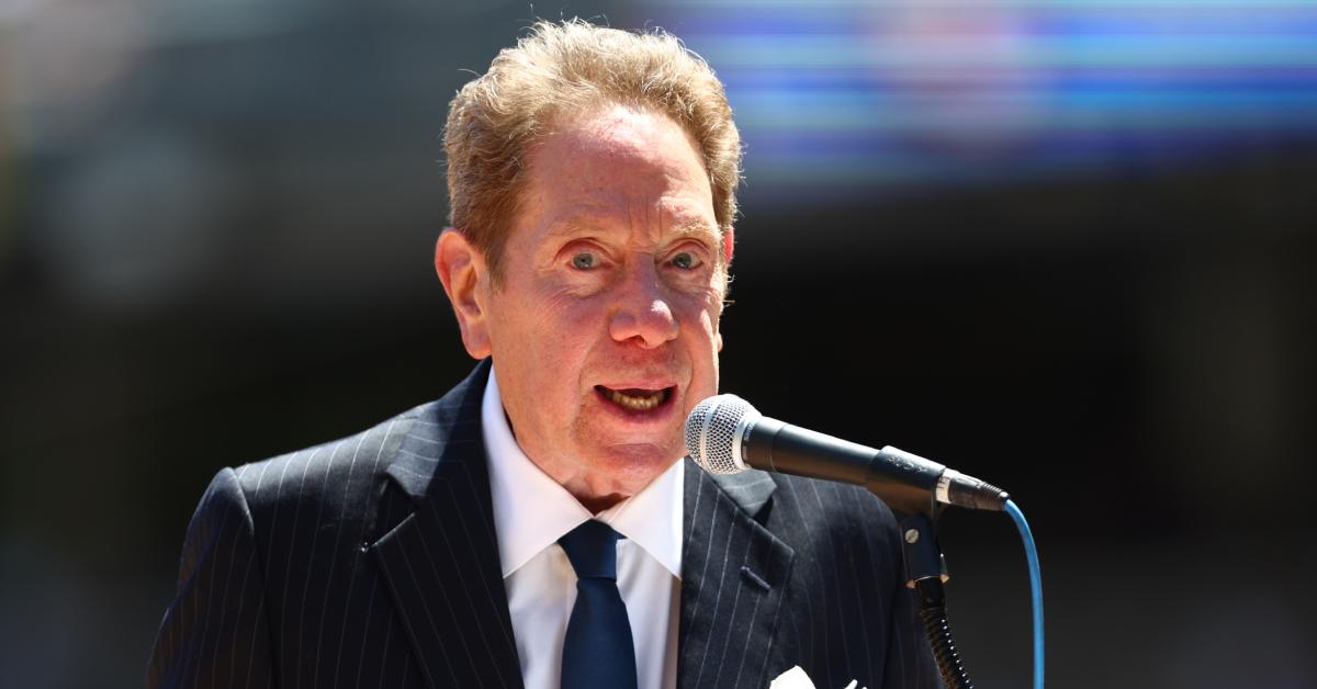 John Sterling emcees the Old Timers Day Ceremony before a game between the Royals and Yankees on July 30, 2022