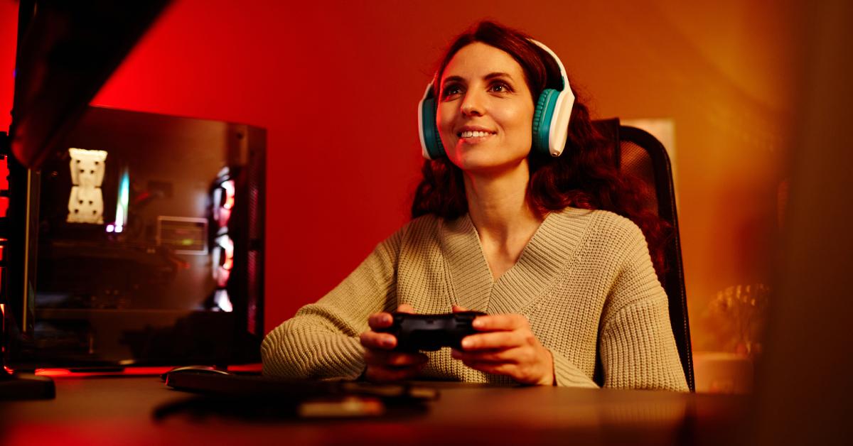 A woman plays video games.