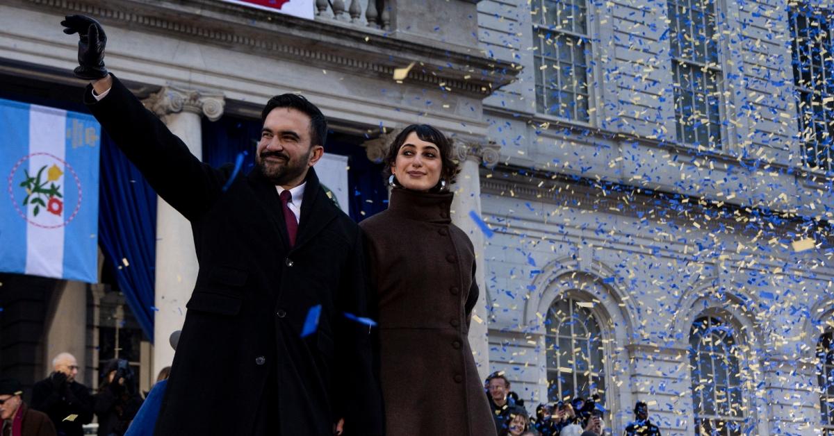(l-r): Zohran Mamdani and his wife at his inauguration