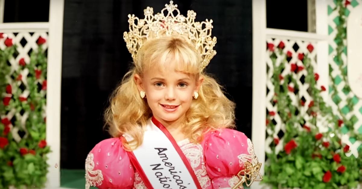 JonBenét Ramsey wearing a pageant crown and sash