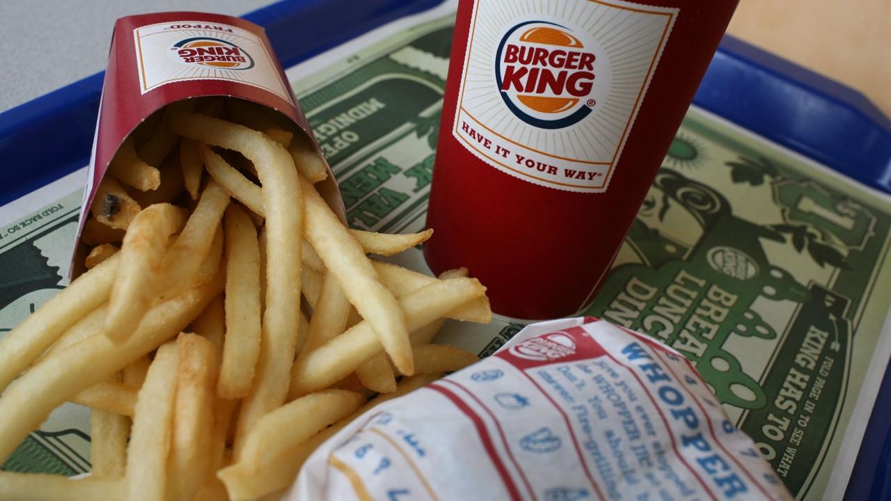 A Burger King Whopper, fries, and drink on a tray