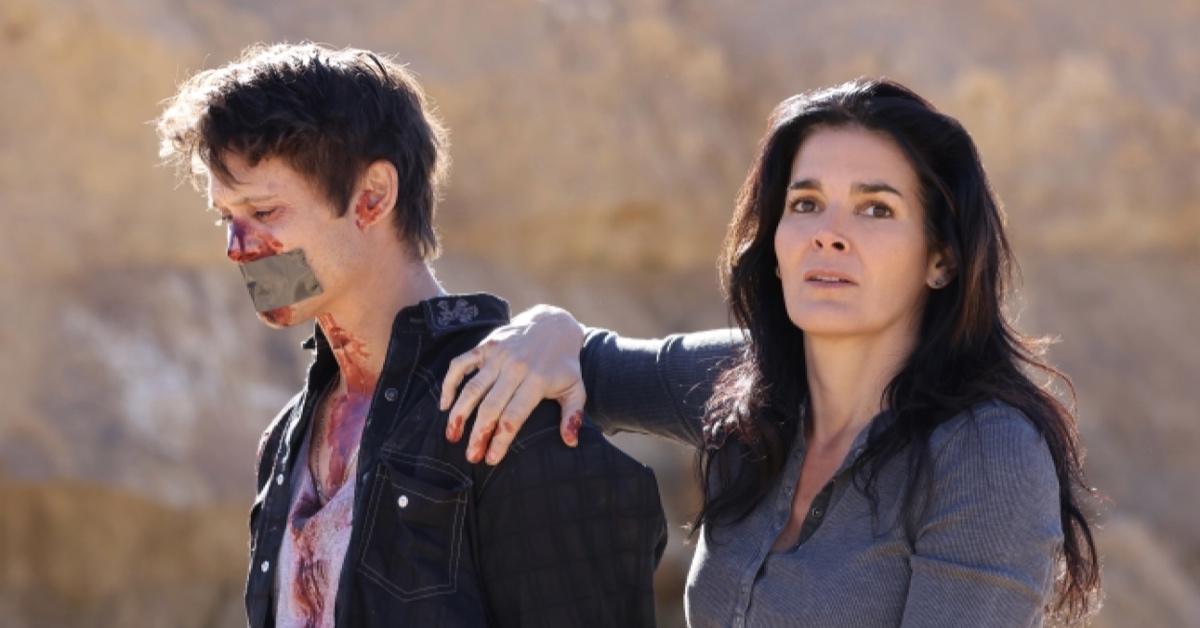 Angie Harmon and Timothy Granaderos in 'Buried in Barstow'