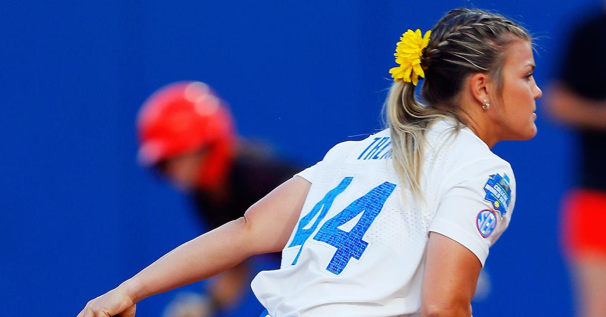 Relief pitcher Rylee Trlicek #44 of the Florida Gators winds up for a throw against the Oklahoma State Cowboys with a runner on first base during the NCAA Women's College World Series at the USA Softball Hall of Fame Complex on June 4, 2022 in Oklahoma City, Oklahoma