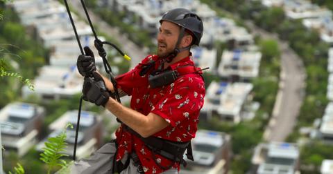 Sean scales a tower in Season 2 of 'The Mole.'