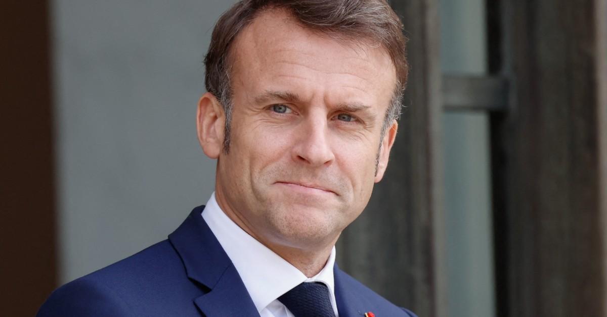 President Emmanuel Macron smiling for the camera