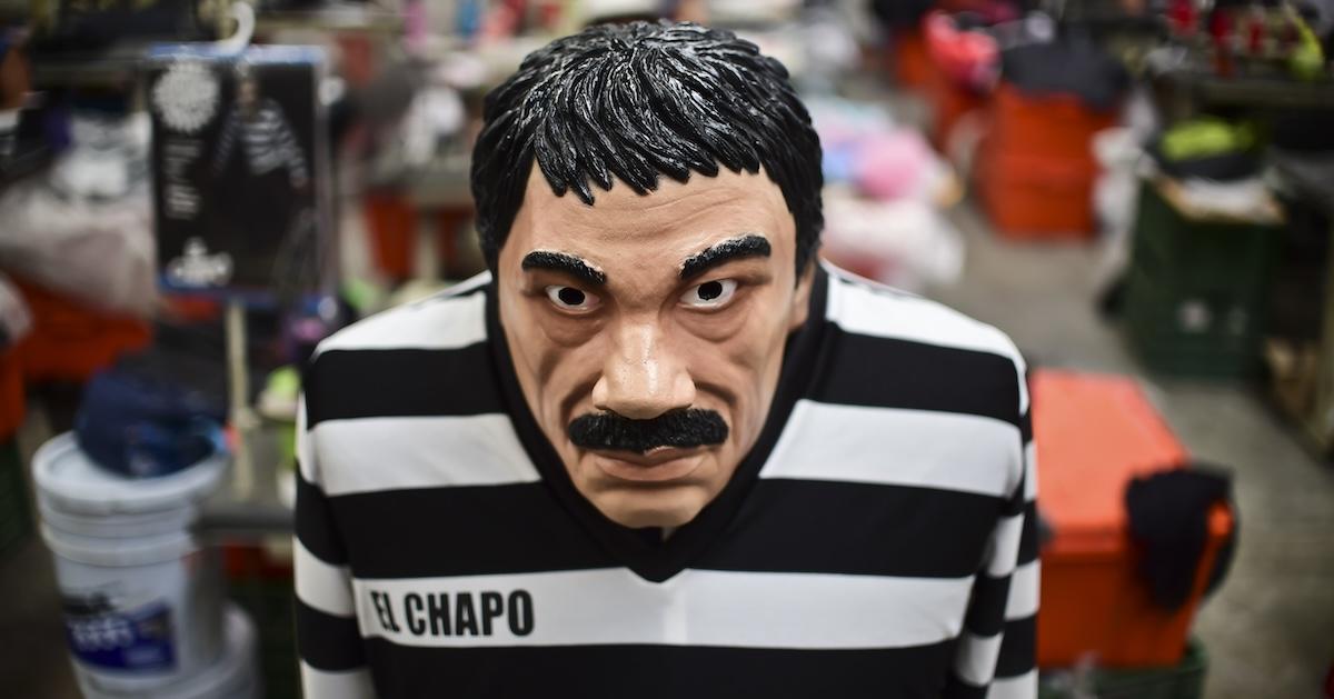 A costume and a mask representing Mexican drug trafficker Joaquin Guzman Loera, aka "El Chapo"