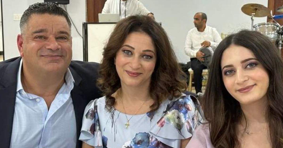 Martin Bally (L) with his wife and daughter.