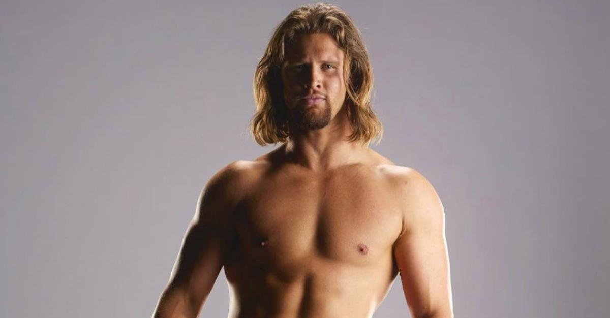 The Bachelorette Season 20 contestant Caleb B. poses in wrestling gear