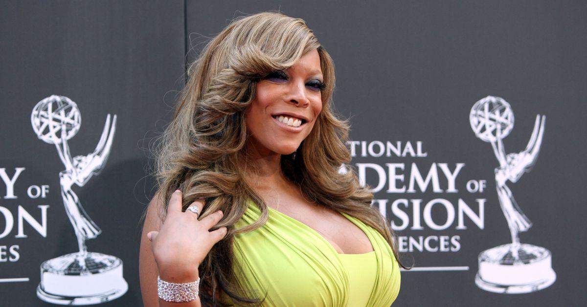 Wendy Williams posing at the Daytime Emmy Awards on the red carpet.