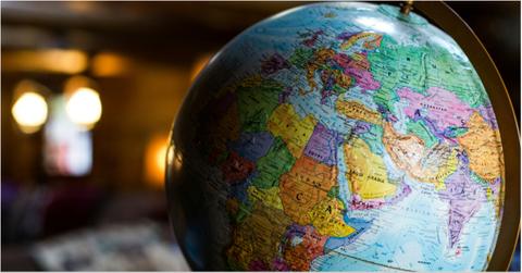 A globe on a table with a blurred background