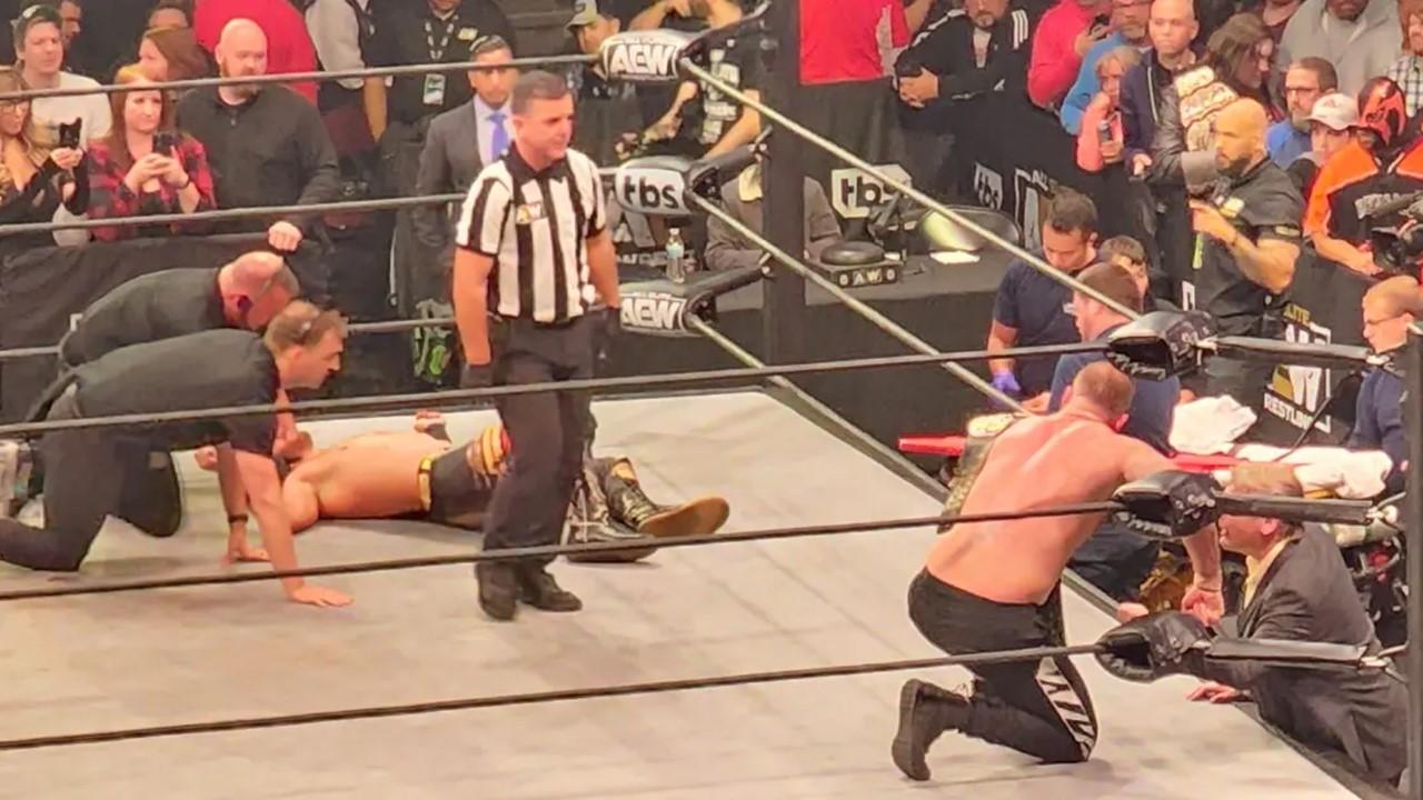 "Hangman" Adam Page laying injured in the ring during 'AEW Dynamite'