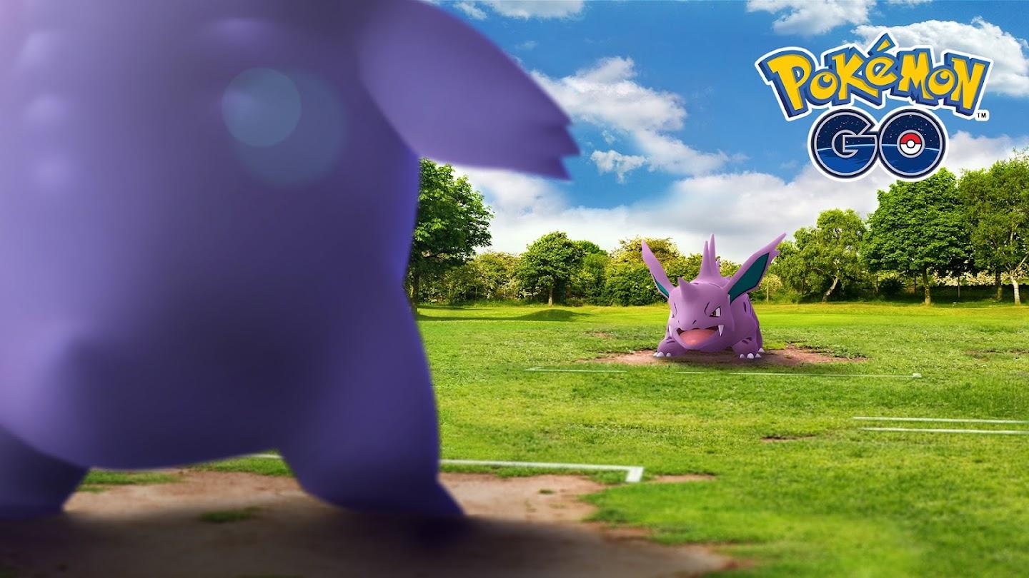 'Pokémon GO' Two creatures preparing to battle on a grassy arena.