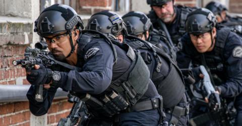 'S.W.A.T' officers entering a building to get the bad guys.