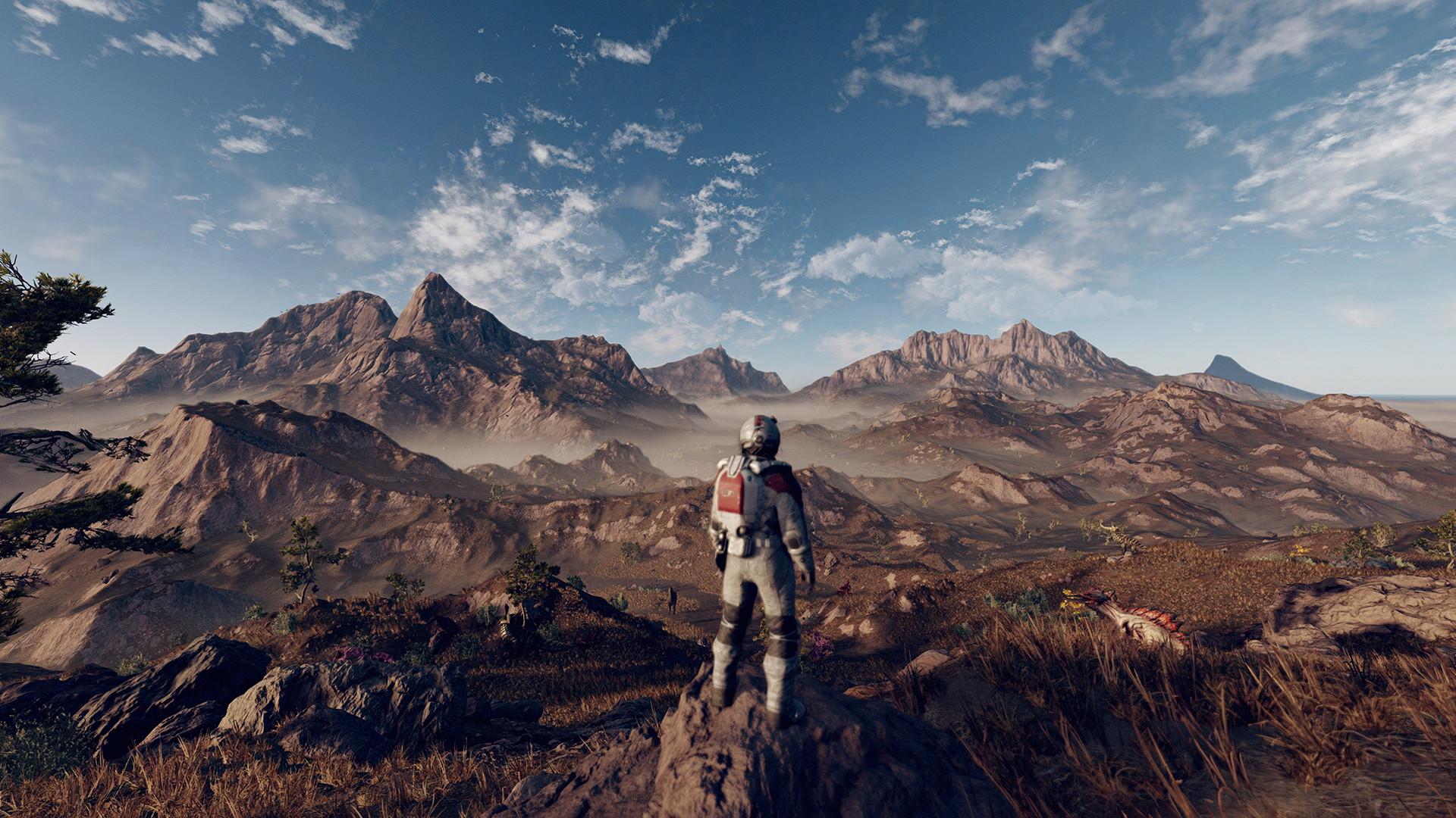 'Starfield' Man in spacesuit standing on a rocky planet.