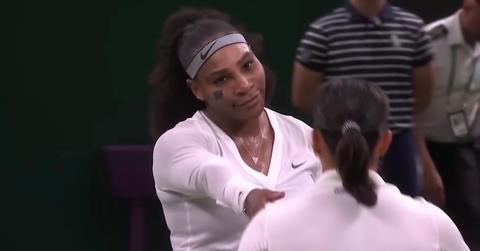 Serena Williams has tape on her face during Wimbledon 2022.