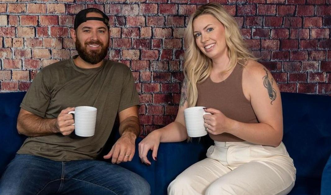 Jaron and Maggie Clay holding coffee cups