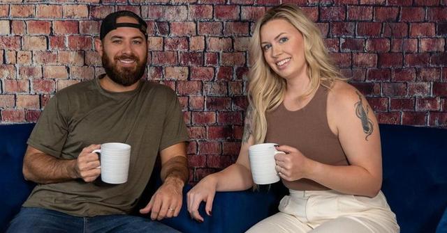 Jaron and Maggie Clay holding coffee cups
