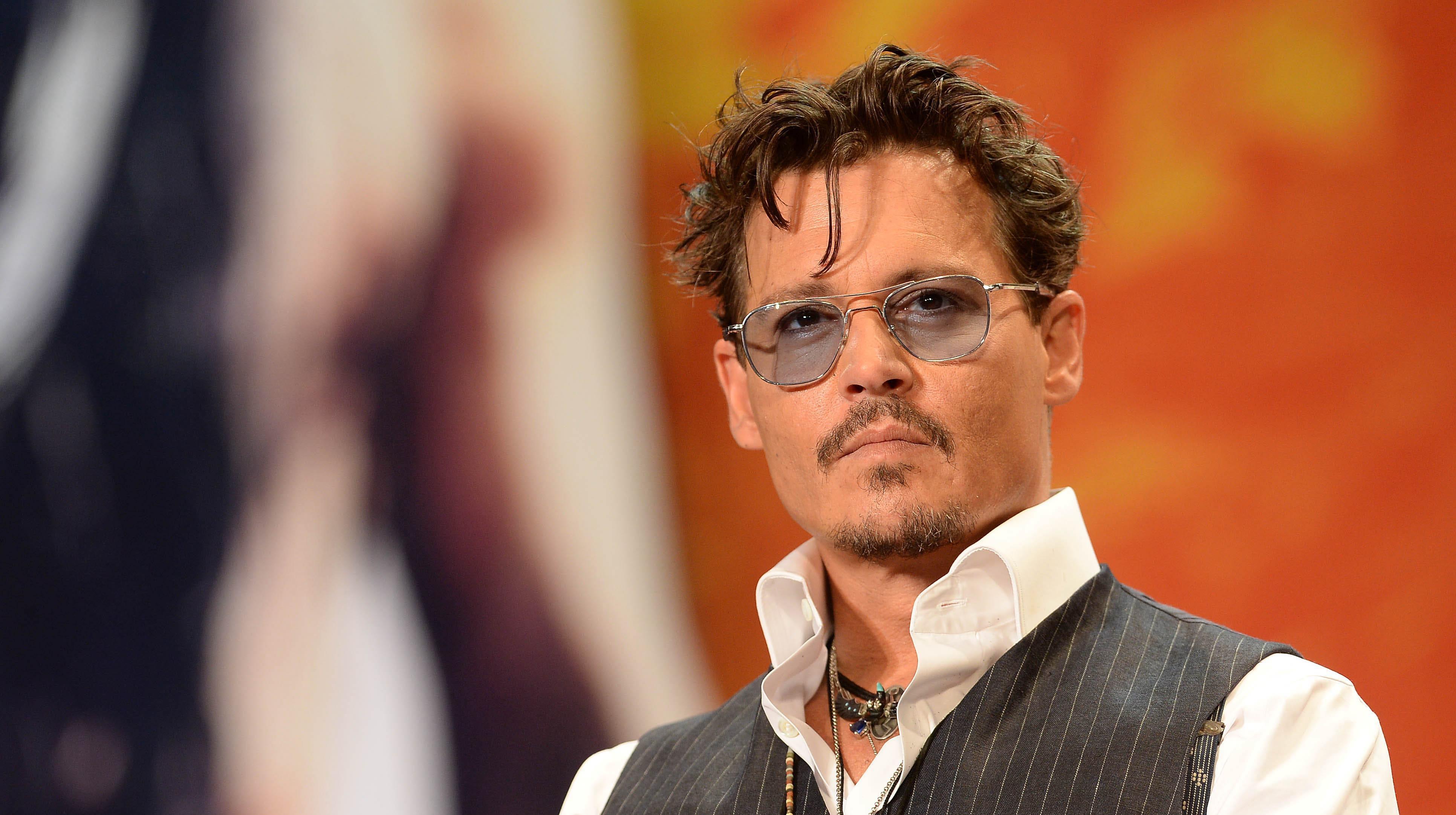 Johnny Depp attends the 'Lone Ranger' Japan Premiere in July 2013.