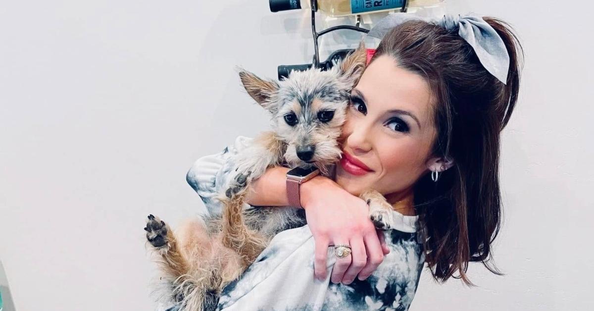 Ana Orsini holding her rescue dog