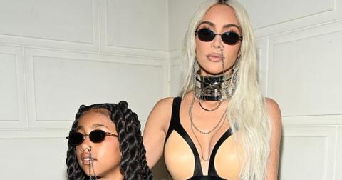 (l-r): North West and Kim Kardashian attending fashion week