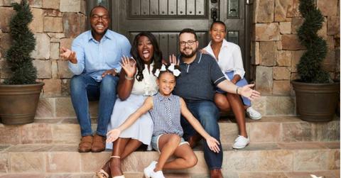 Nicole Walters and her kids, husband, and assistant taking promotional photos for their new show 'She's the Boss'.