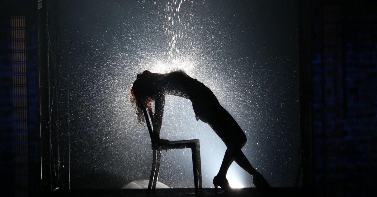 Jennifer Beals as Alex in 'Flashdance' dancing as a bucket of water pours over her.