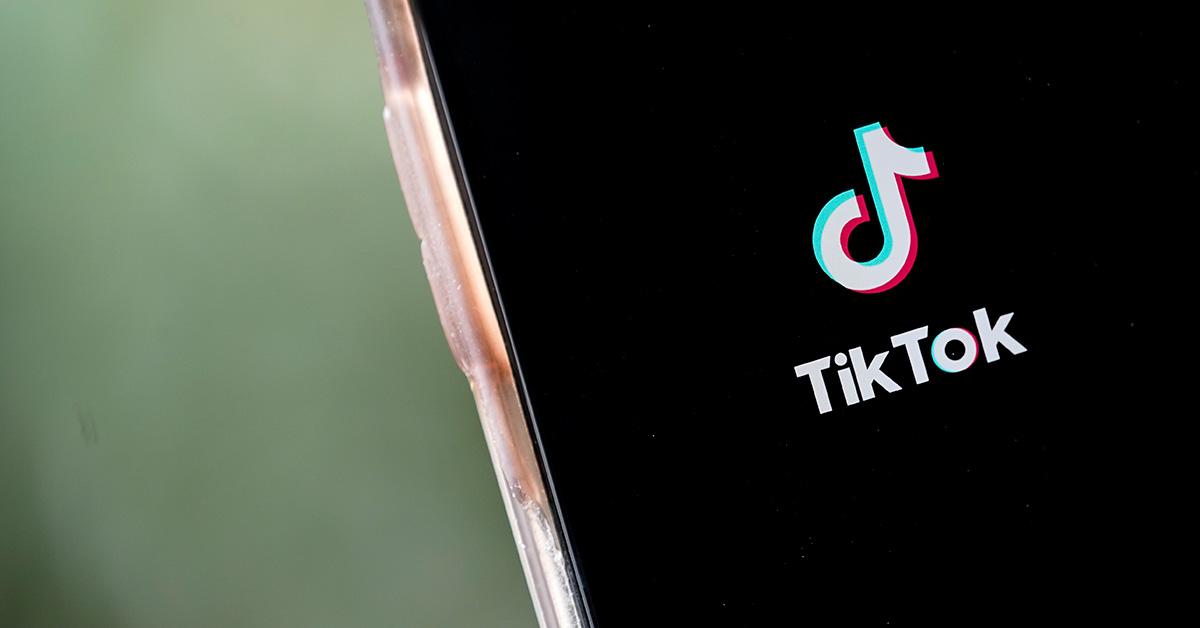 A TikTok logo on a cell phone. 