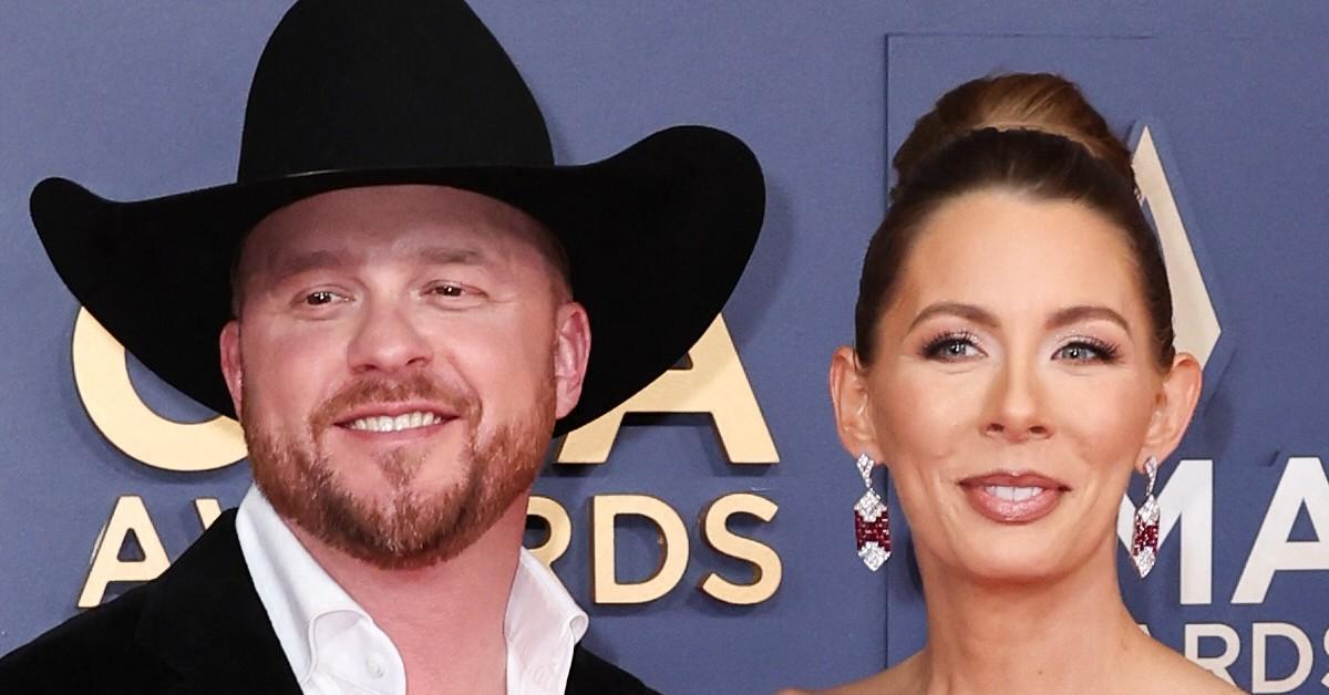 Cody Johnson with his wife at an award ceremony