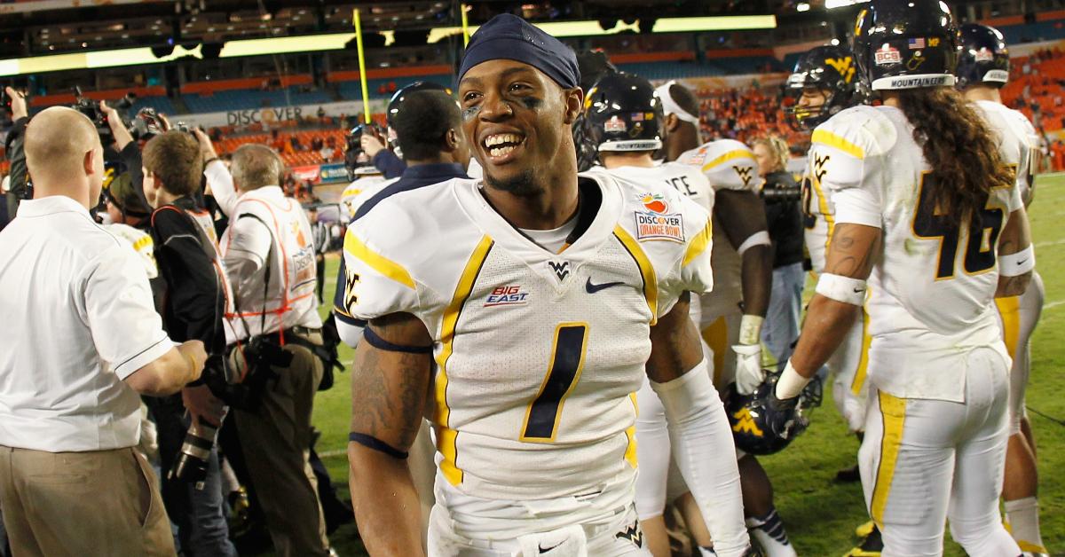 Tavon Austin celebrates West Virginia's win against the Clemson Tigers on Jan. 4, 2012, in Florida.