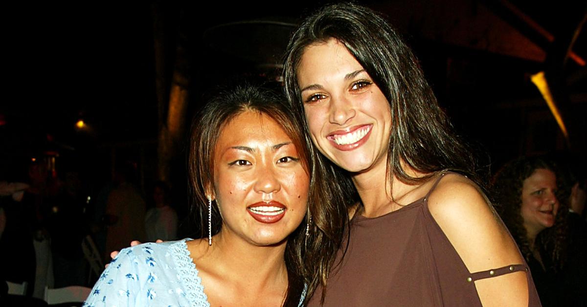 'BB4' winner Jun Song and 'BB3' winner Lisa Donahue pose at the wrap-party for 'Big Brother 4' on Sept. 27, 2003