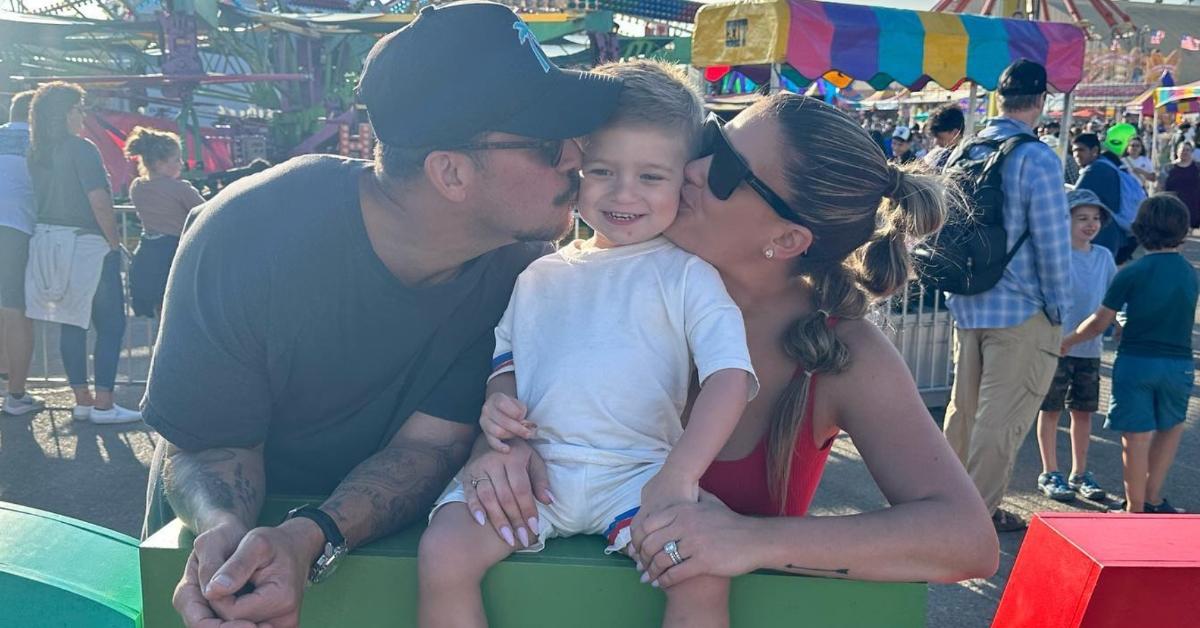 Jax Taylor and Brittany Cartwright kiss their son Cruz at carnival