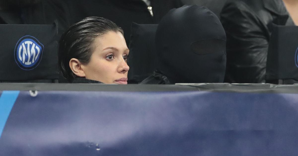 Kanye West wearing a mask with his wife, Bianca Censori.