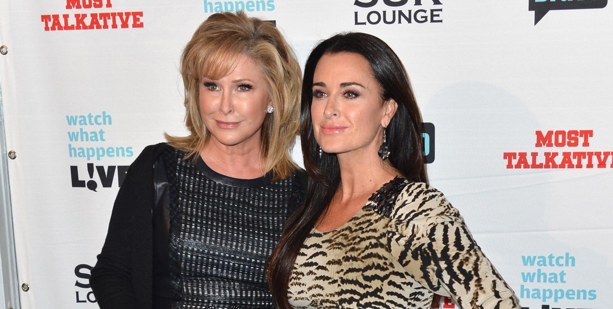 Kyle Richards and Kathy Hilton posing on the red carpet. 