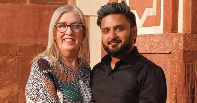 (l-r): Jenny and Sumit from '90 Day Fiance' smiling for a promotional photo.