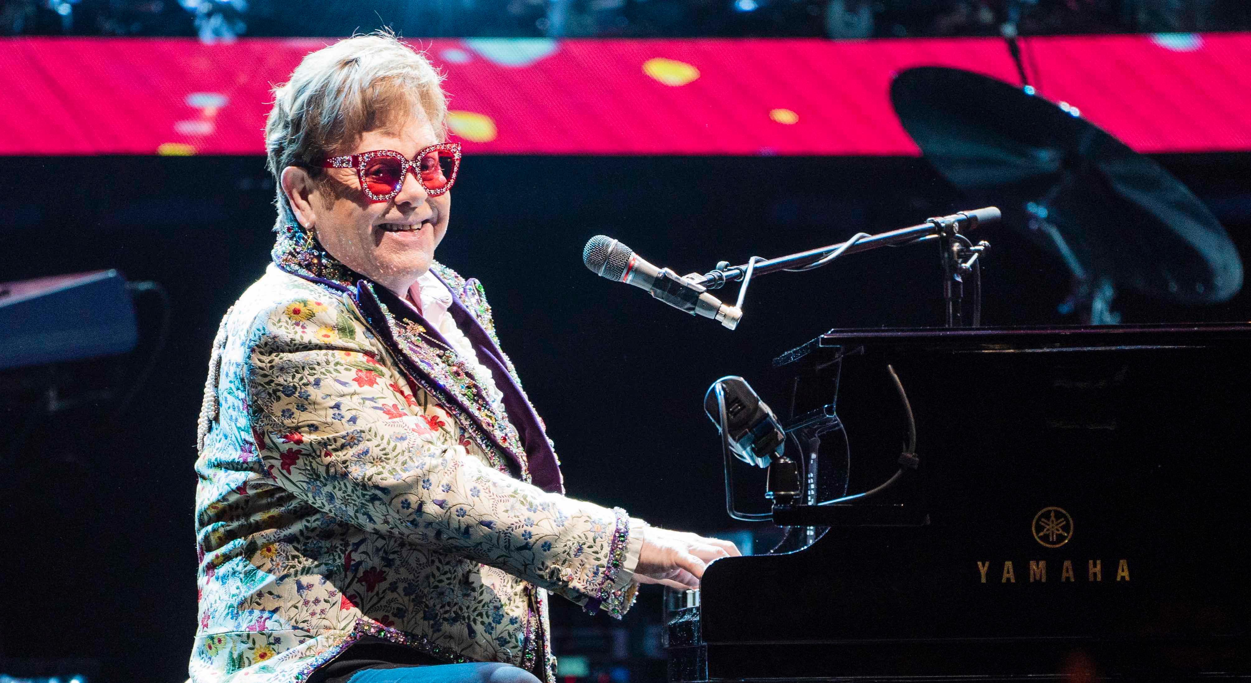 Sir Elton John performing on tour in 2022.