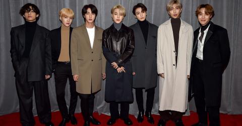 Members of BTS pose for a photograph