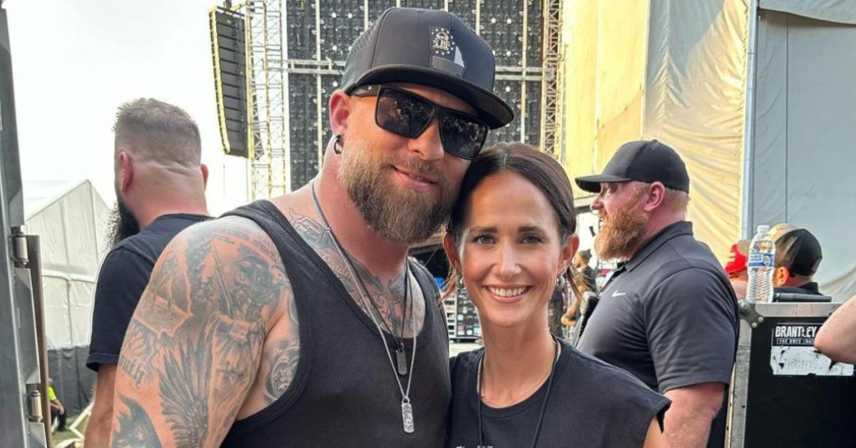 Brantley Gilbert and his wife Amber Cochran Gilbert at a concert.