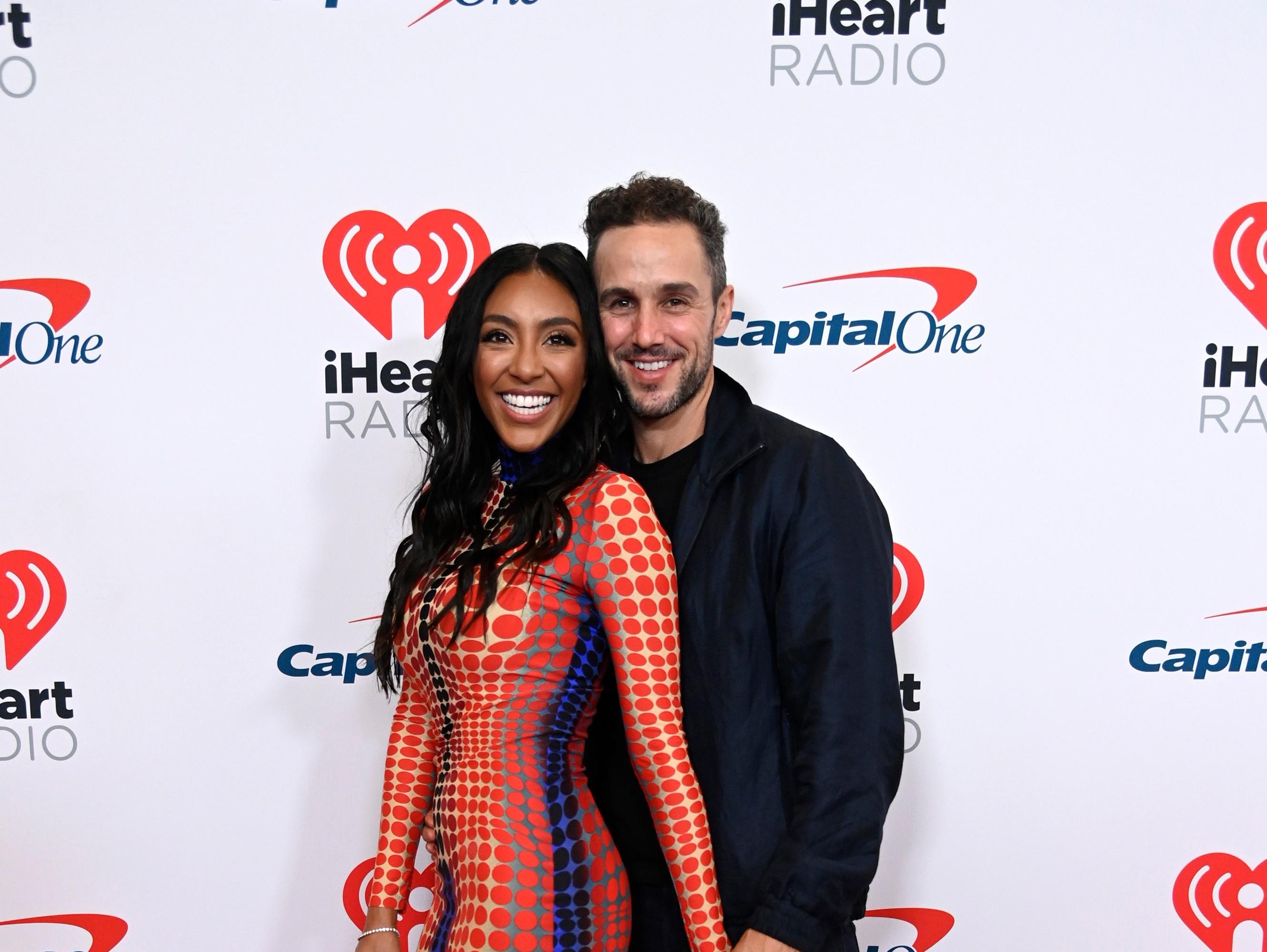 Tayshia Adams and Zac Clark attend the 2021 iHeartRadio Music Festival.