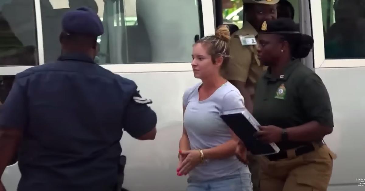 Lindsay Shiver is escorted by Bahamian police