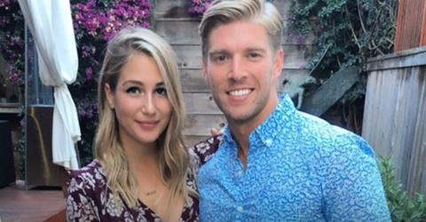 Amanda and Kyle at their engagement party with friends,