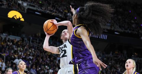 Caitlin Clark and Angel Reese playing against each other on April 1, 2024