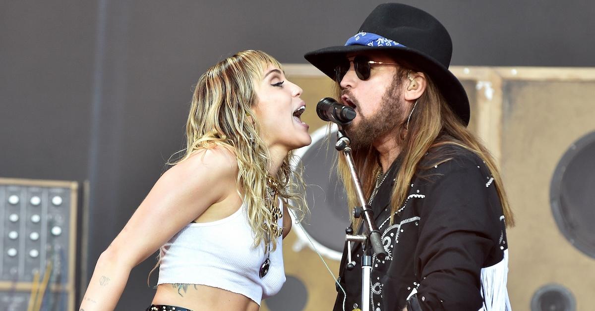 Miley and Billy Ray Cyrus singing together at Glastonbury in 2019