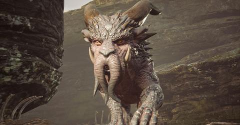 A Graphorn slowly stalking around rocks in 'Hogwarts Legacy'