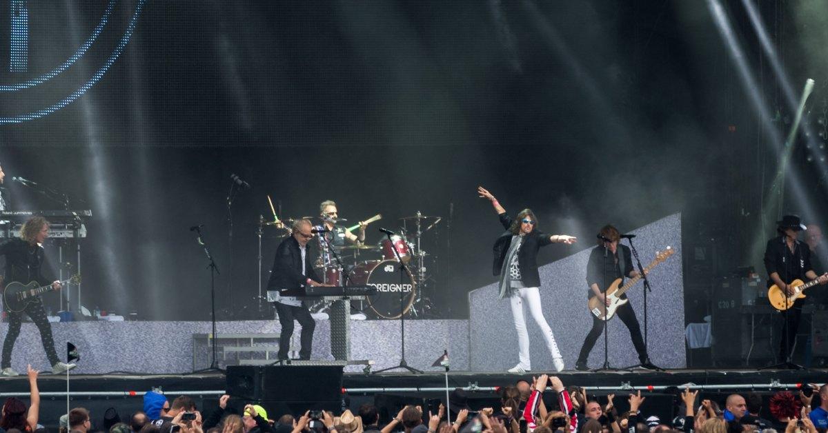 Foreigner performing on stage.