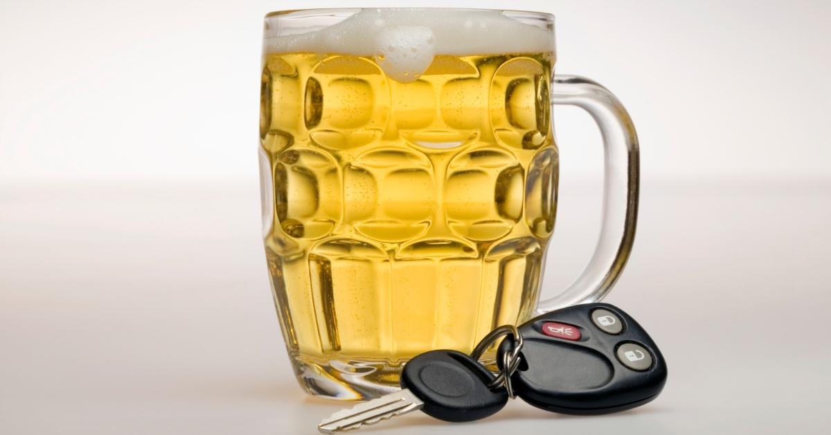 car keys next to beer