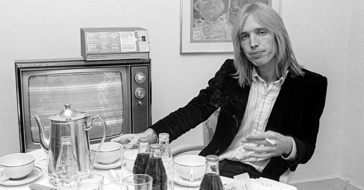 Tom Petty sits in his home