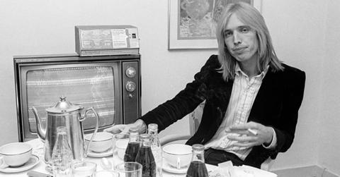 Tom Petty sits in his home